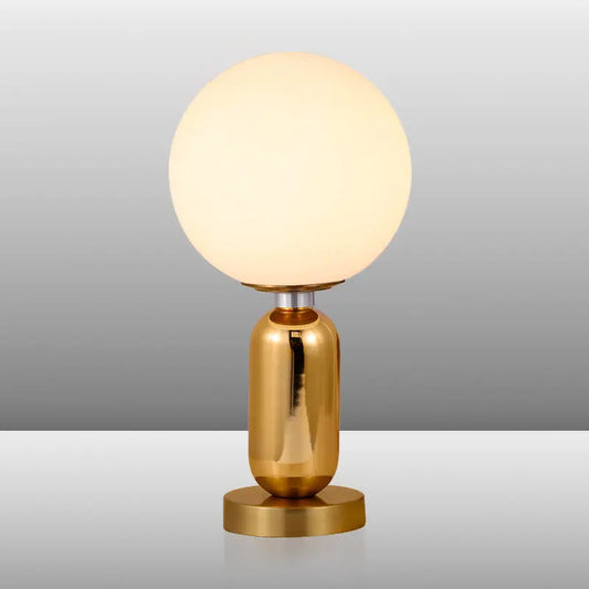 LumiSphère - Lampe Sphérique en Verre avec Socle en Métal Doré - Rynova